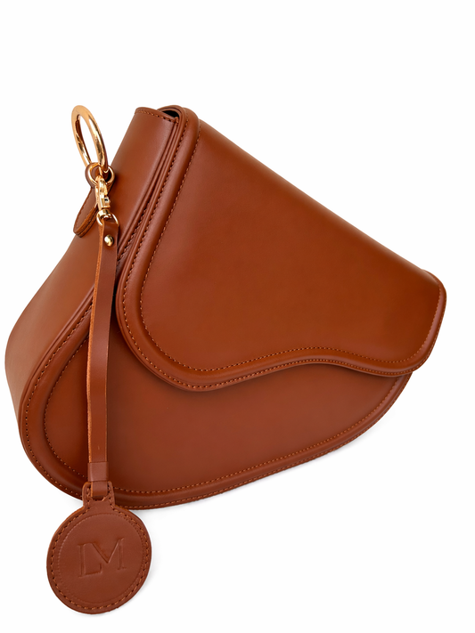 Sac Selle-LM marron en cuir véritable Laure Montigny, design selle de cheval, bandoulière dorée modulable