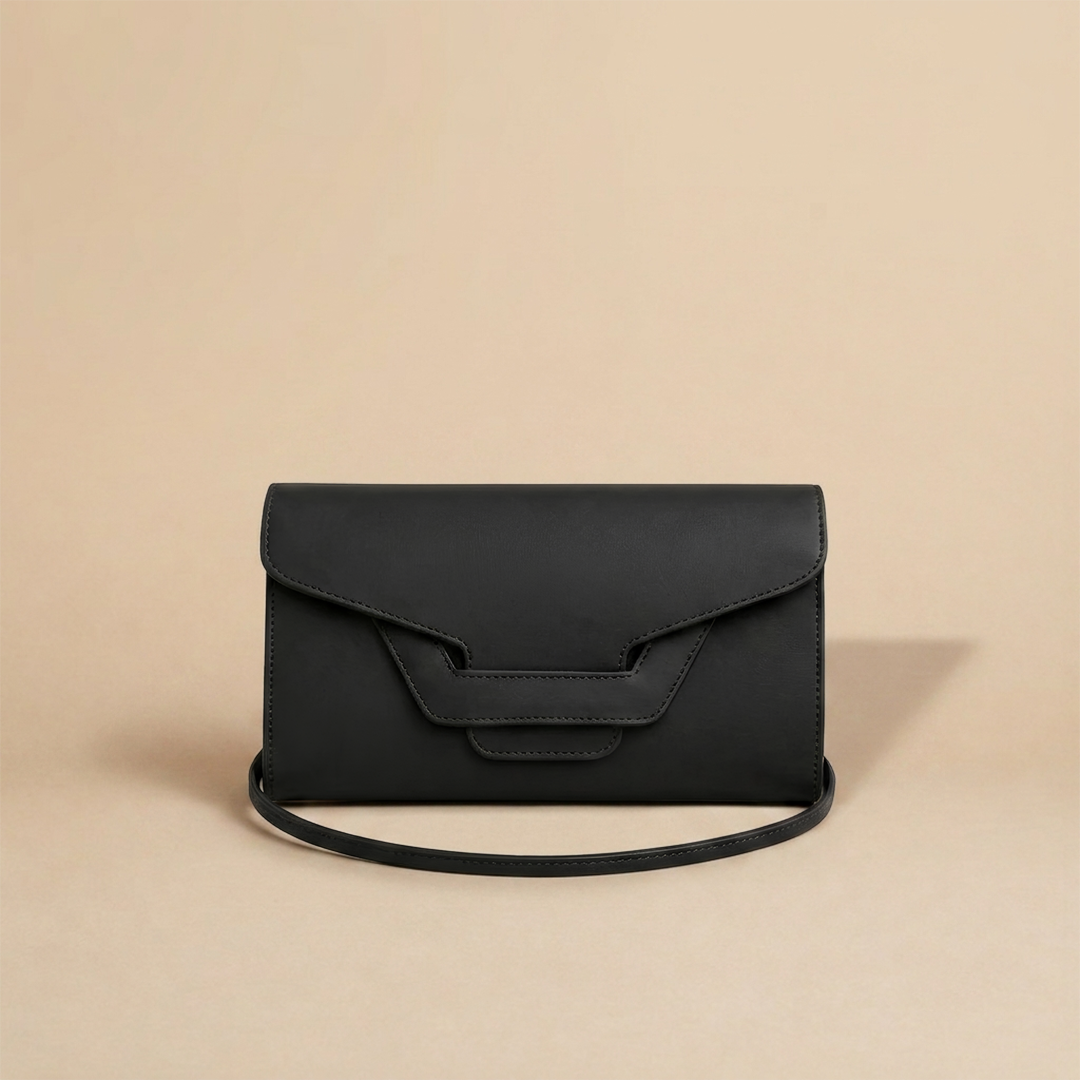 Pochette Étrier noire en cuir véritable Laure Montigny, fermoir étrier de selle