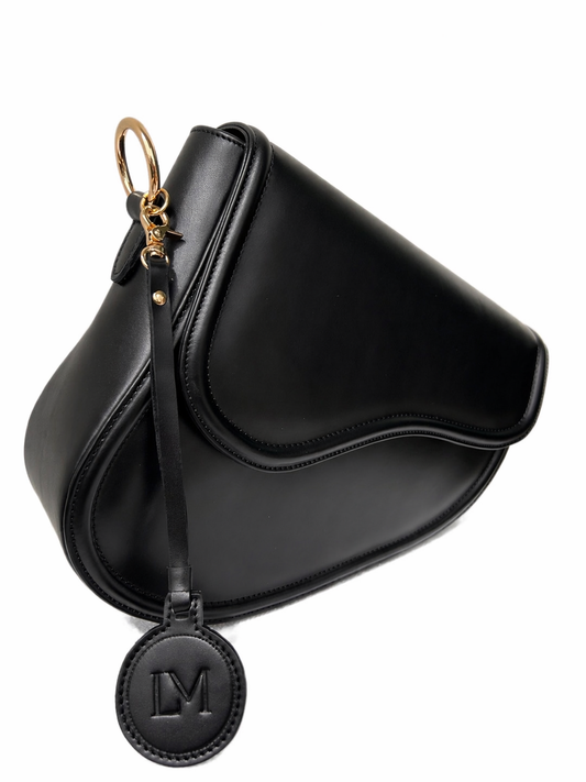 Sac Selle-LM noir en cuir véritable Laure Montigny, design selle d'équitation, bandoulière dorée modulable