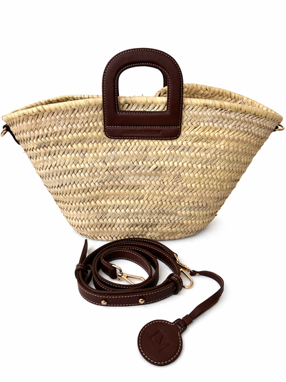 Panier Amazone marron en paille naturelle Laure Montigny, anse cuir étrier de selle, fabrication artisanale marocaine